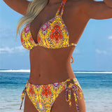Spalvingi bikinis su dizainu ant kaklo dirželiais