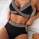Bikini su graikišku raštu, bustier dizainu su sukryžiuotomis detalėmis ir aukštu liemeniu